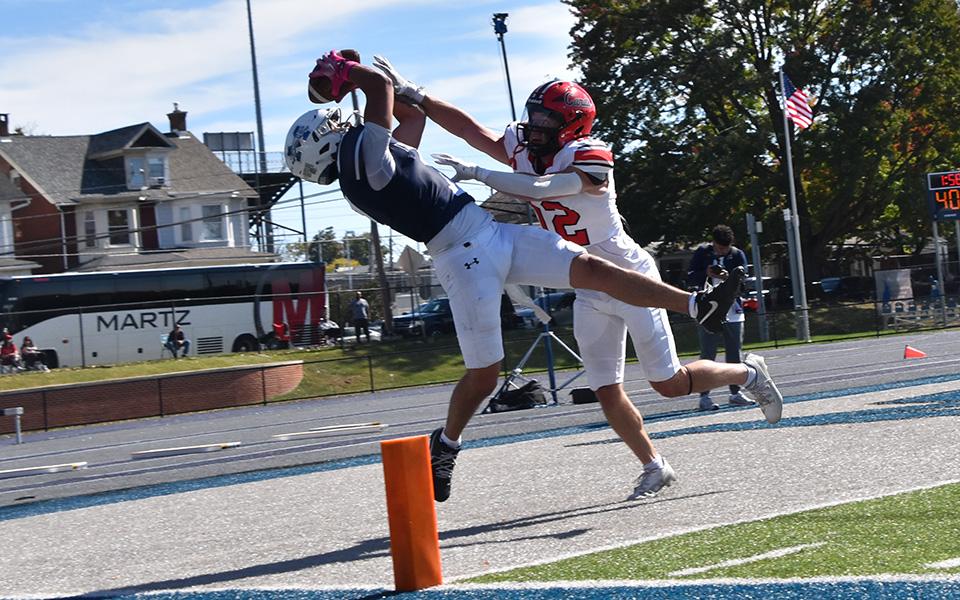 Senior wide receiver Diego Del Castillo pulls in his third touchdown reception of the game versus The Catholic University of America at Rocco Calvo Field. Photo by Rori Smith '28