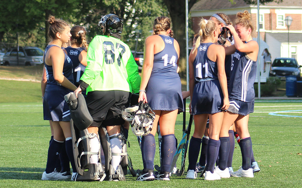 The Greyhounds huddle before the start of the second half during their 2019 season opener versus DeSales University on John Makuvek Field.