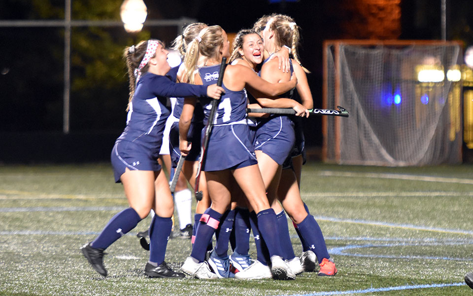 The Greyhounds celebrate a goal scored by Onalee Long versus Juniata College under the lights on John Makuvek Field. Photo by Avery Saladino '24