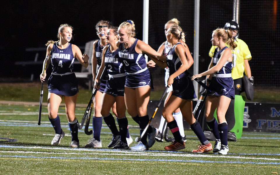 The Greyhounds celebrate a goal by Bekkah Kehoe in the fourth quarter of a non-conference win over King's College on John Makuvek Field. Photo by Kyle Heimenz '26