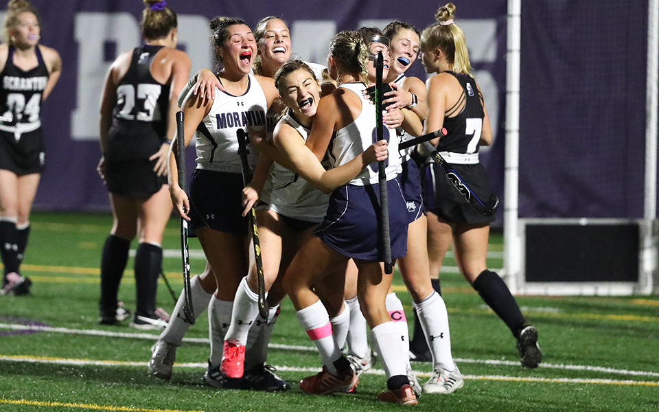 The Greyhounds celebrate after Maddie Call '23 scored the game-winning goal in the 59th minute to lift Moravian over top seed The University of Scranton in the 2022 Landmark Conference Semifinals. Photo by Timothy R. Dougherty/Double Eagle Photography