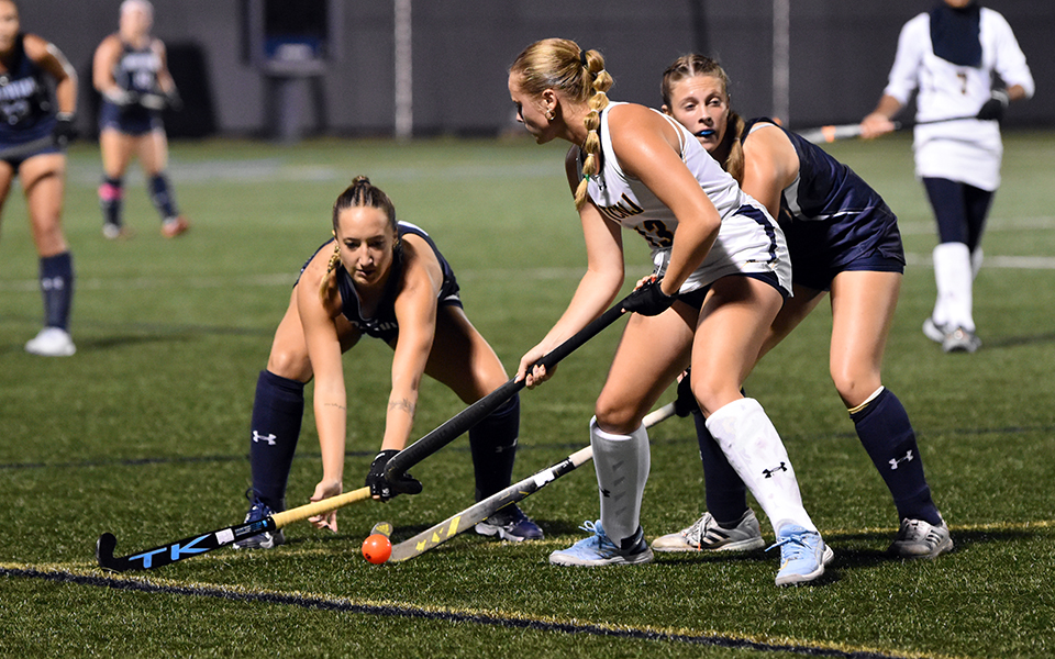 Sophomore midfielder Megan Felmly and junior forward Sydney Anderson on defense in the first quarter versus No. 19 The College of New Jersey on John Makuvek Field. Photo by Avery Saladino '24