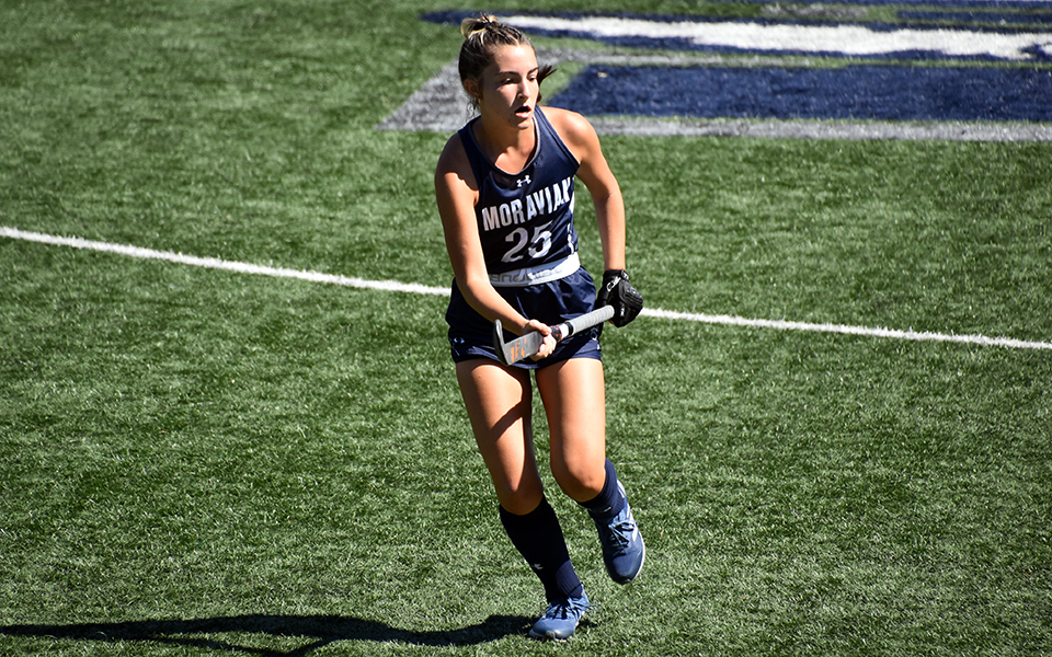 Sophomore forward Gia Ambrosino looks for a pass in a match versus The University of Scranton on John Makuvek Field this season. Photo by Christine Fox