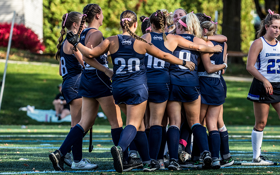 The Greyhounds come together after junior Sydney Anderson scored the winning goal in double overtime of a Landmark Conference Tournament First Round match on John Makuvek Field. Photo by Cosmic Fox Media / Matthew Levine '11