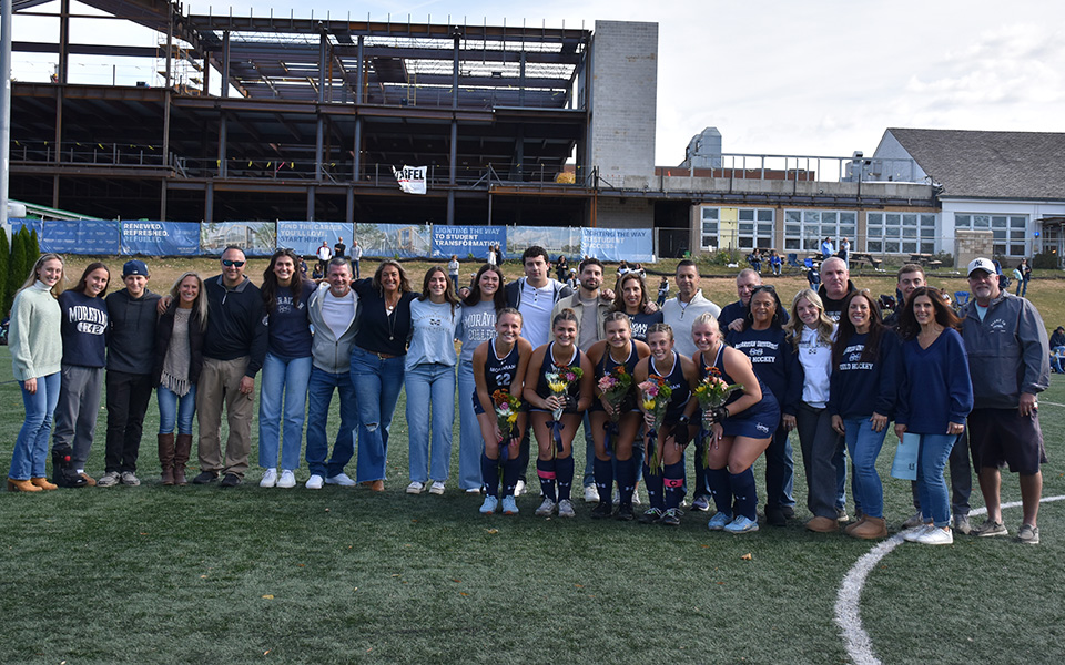 The 2024 Moravian University field hockey seniors and their families during Senior Day before hosting Juniata College on John Makuvek Field. Photo by Roman Verdicchio '28