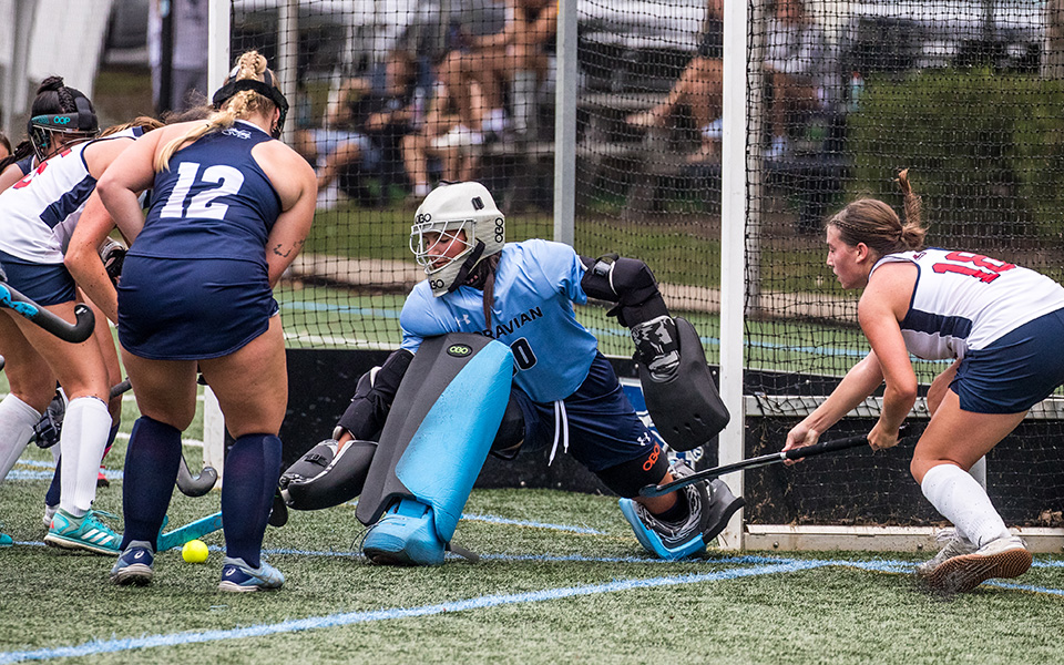 Sophomore goalie Maia Machado makes a save versus DeSales University earlier this season on John Makuvek Field. Photo by Cosmic Fox Media / Matthew Levine '11