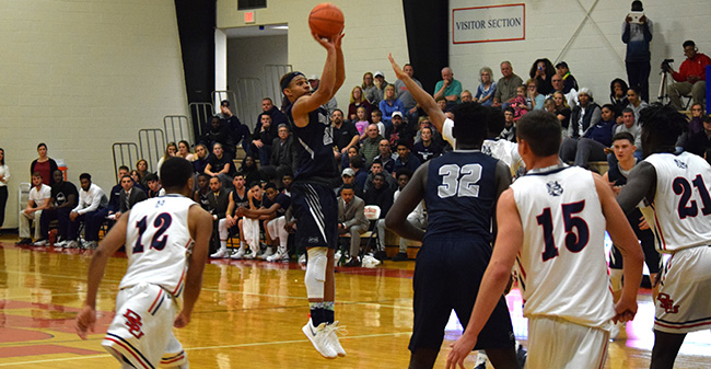 C.J. Barnes '20 attempts a three-pointer in the first half at DeSales University.