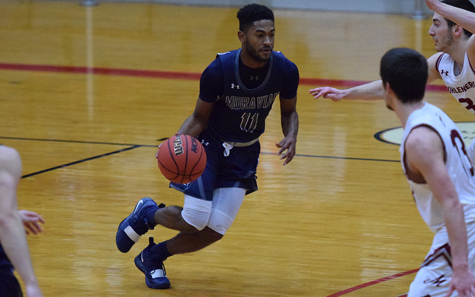 Senior Jimmy Murray drives towards the basket in a game at Muhlenberg College.