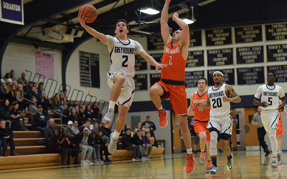 Sophomore Matt O'Connor goes up for a fast break lay-up in the first half versus Susquehanna University in Johnston Hall.