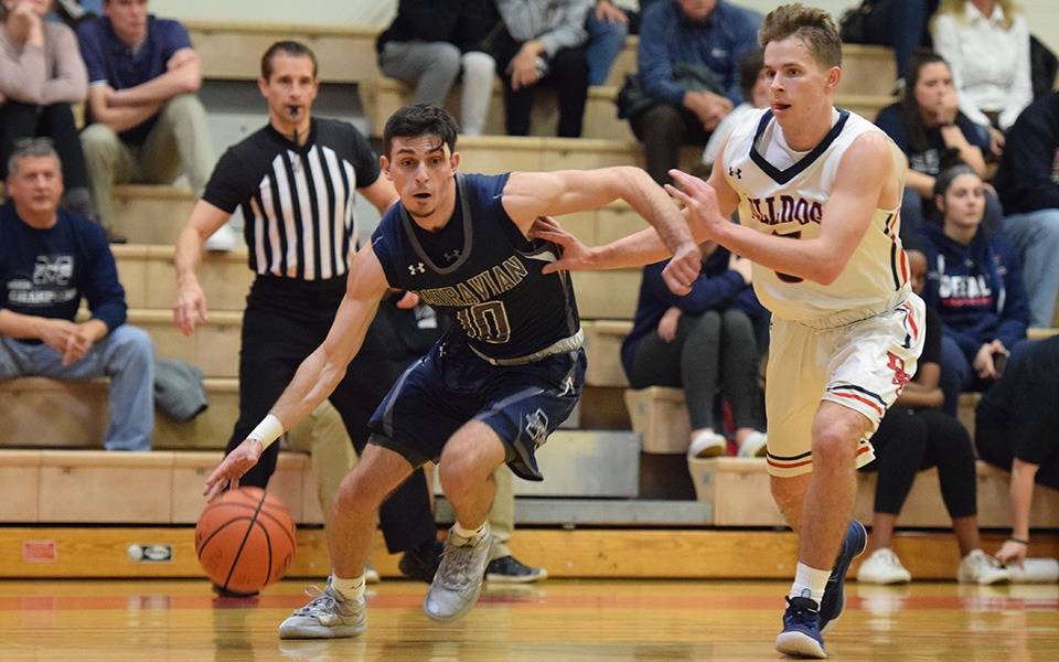 Senior Mike Martino drives towards the basket in the first half at DeSales University.
