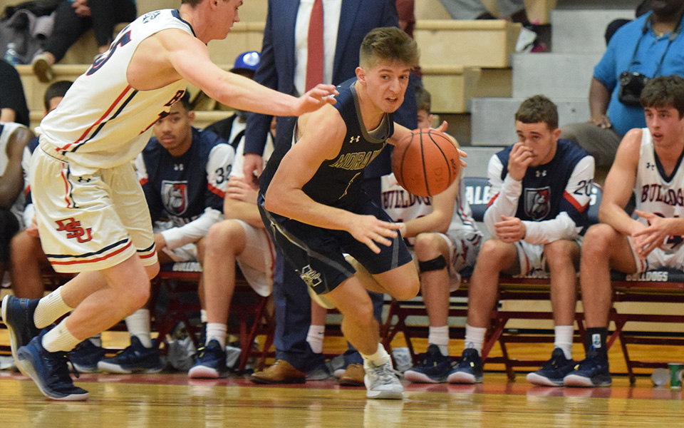 Junior Keith Otto makes a move towards the basket during the first half of a game at DeSales University.