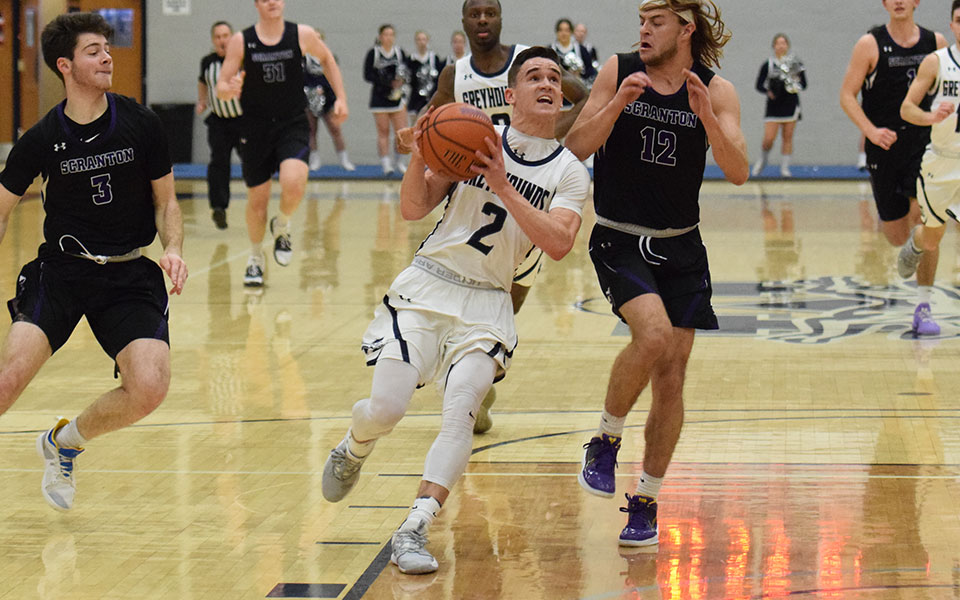 Senior guard Matt O'Connor drives to the basket after a steal in a game versus The University of Scranton in Johnston Hall earlier this season.
