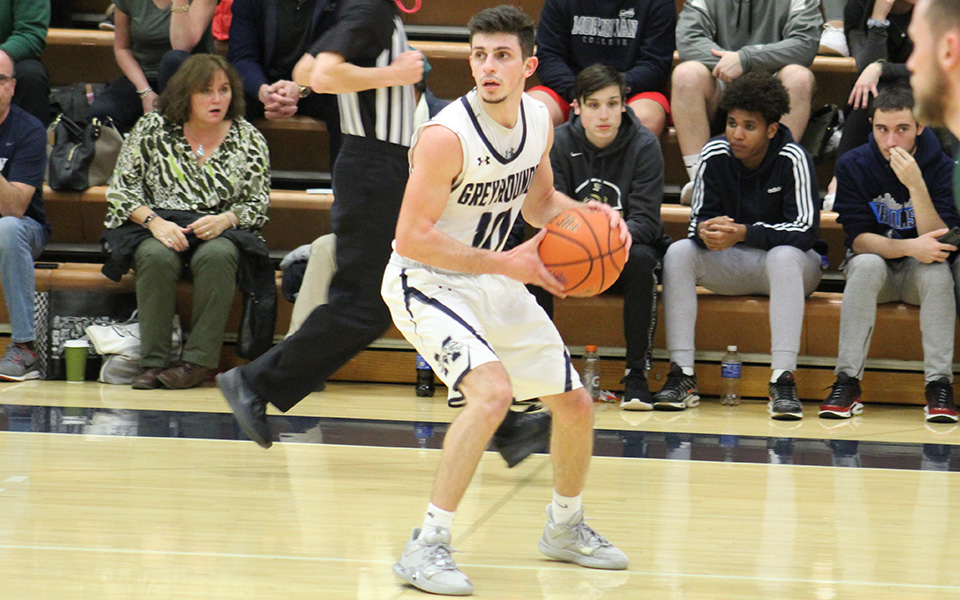 Senior guard Mike Martino looks to pass in the second half versus Drew University in a game in Johnston Hall in January 2020.