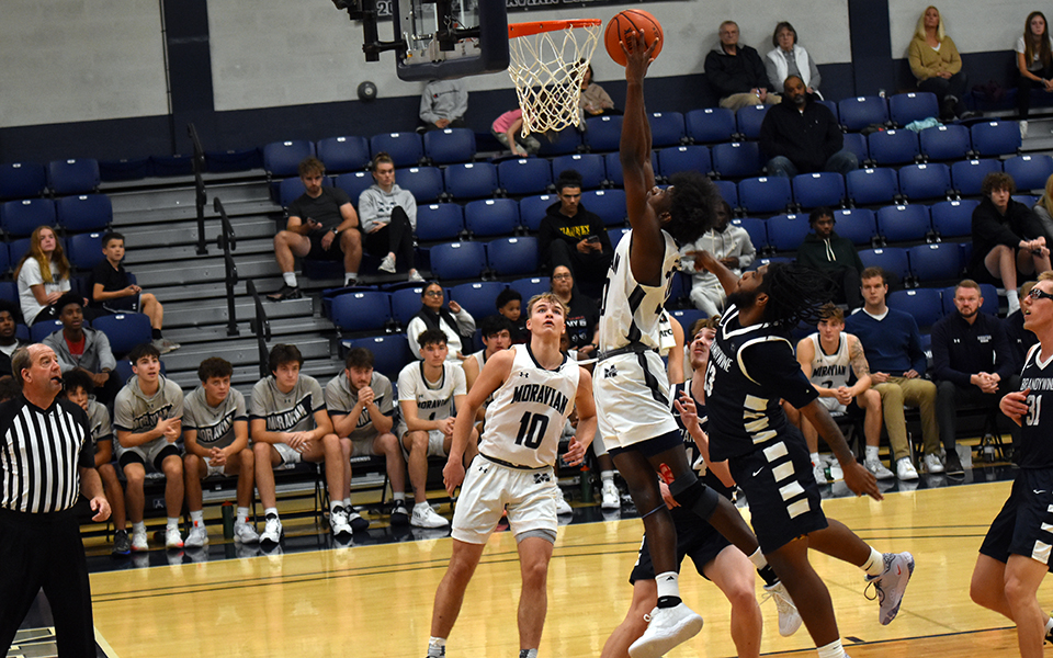 Freshman Marquis Ratcliff goes up for a lay-up in the second half versus Penn State Brandywine in Johnston Hall. Photo by Avery Saladino '24
