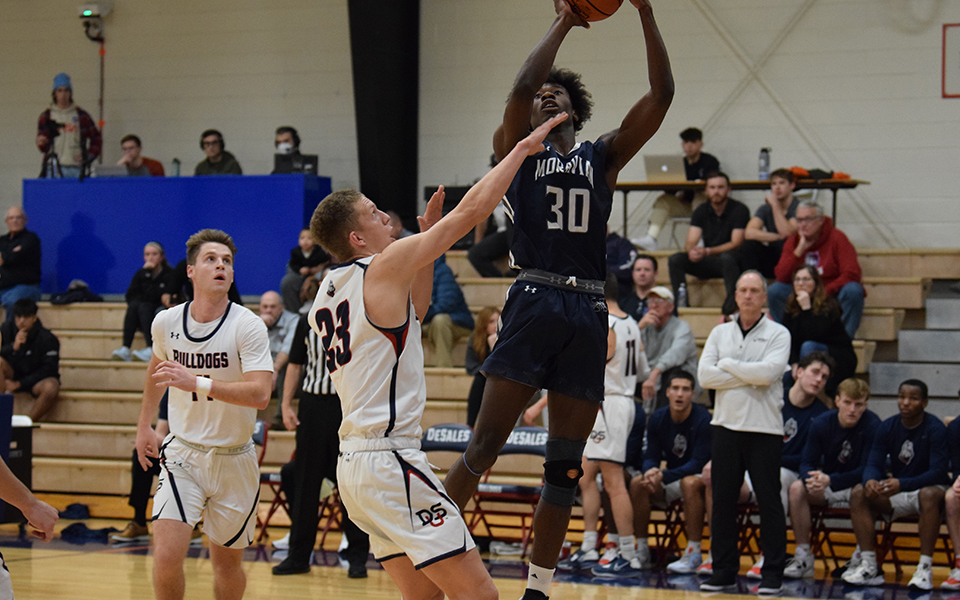 Freshman forward Marquis Ratcliff goes up for two points in the first half of a game at DeSales University.