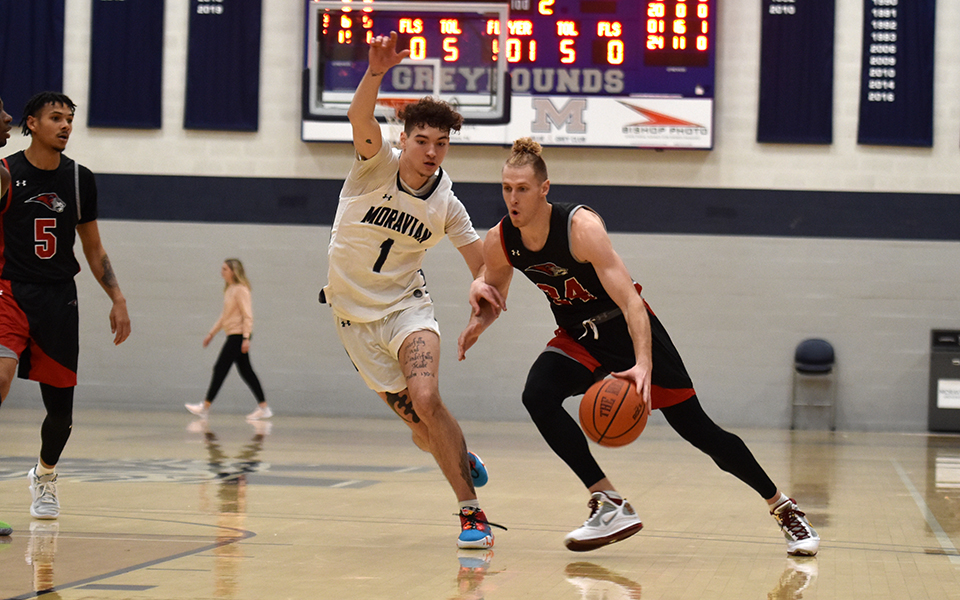 Sophomore guard/forward Michael Leonardo on defense in the second half versus Bryn Athyn College in the 42nd Steel Club Classic in Johnston Hall. Photo by Mairi West '23