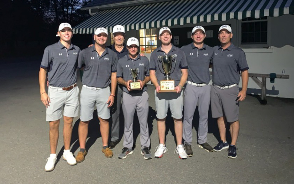 The Greyhounds pose at the Weyhill Course of the Saucon Valley Country Club with former Head Coach John Makuvek after the squad won the Makuvek Cup for the fifth straight year over DeSales University and Muhlenberg College.