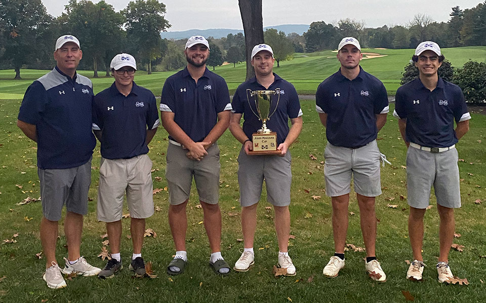 The Greyhounds with the John Makuvek Cup at the Lehigh Country Club after winning the trophy for the sixth consecutive time.