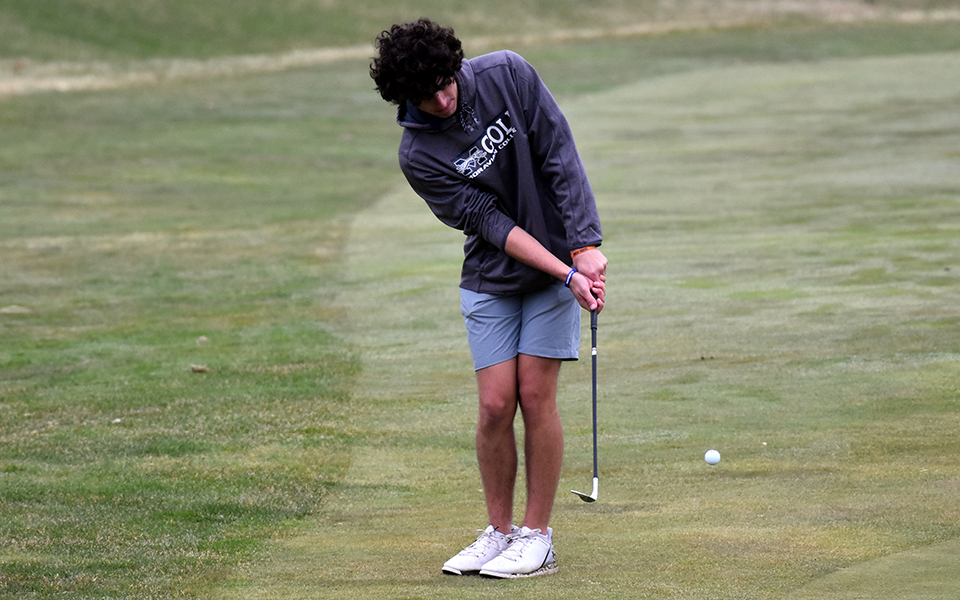 Sophomore TJ Bohl chips onto the 9th green at Olde Homestead Golf Club during the Moravian Spring Classic.