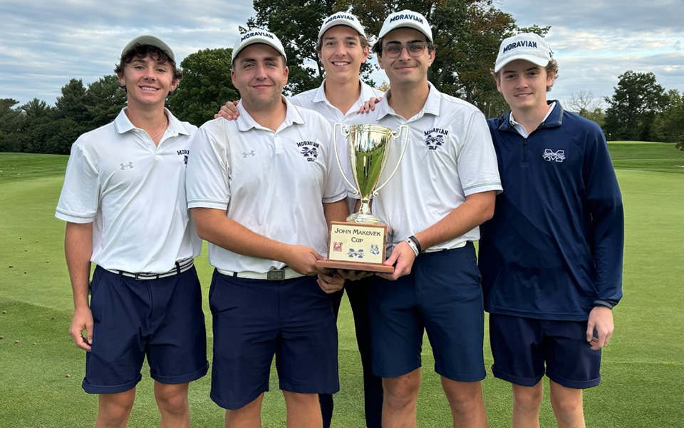The Greyhounds with the John Makuvek Cup after capturing with the trophy for the ninth consecutive tournament at Lehigh Country Club.