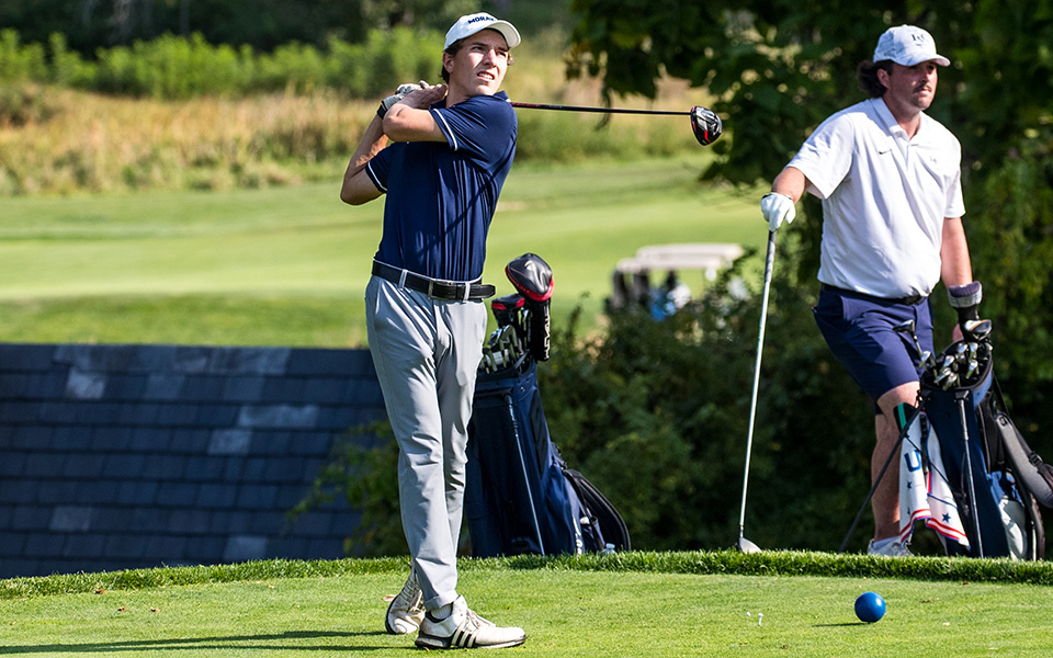 Freshman Timm Leidecker watches his tee shot during the Moravian Weyhill Classic at the Saucon Valley Country Club Weyhill Course. Photo by Cosmic Fox Media / Matthew Levine '11