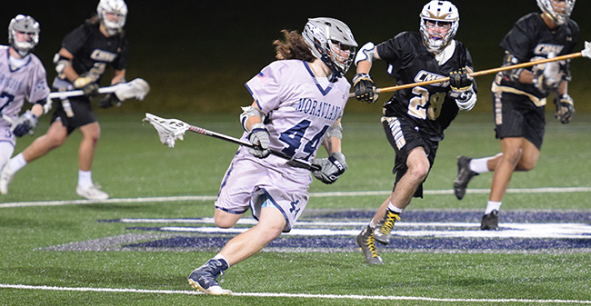 Stas Lembryk '20 races downfield to net his first collegiate goal versus the College of Mount Saint Vincent under the lights on John Makuvek Field.