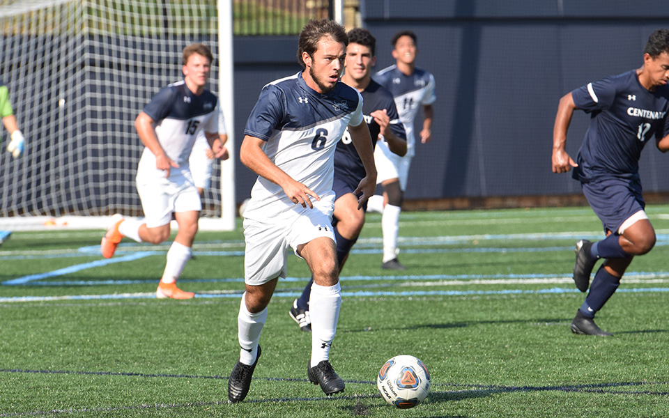 Sophomore Mike D'Angelo moves the ball up the field versus Centenary University at John Makuvek Field.