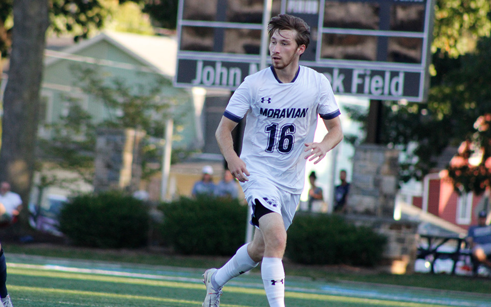 Carson Snyder tracks the ball in a match versus Neumann University on John Makuvek Field.