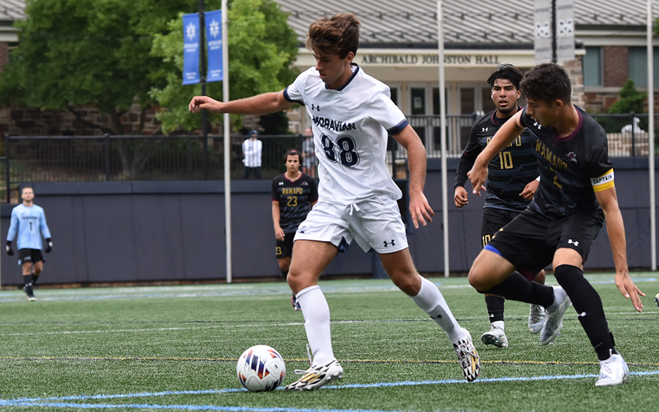 Sophomore forward Ben Scary gets set to pass in a match versus Ramapo College of New Jersey on John Makuvek Field. Photo by Avery Saladino '24.