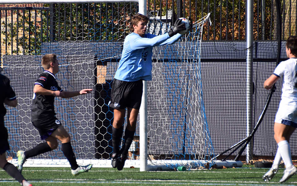 Goalie Andrew Remias makes a save in a match versus The University of Scranton on John Makuvek Field during the 2022 season. Photo by Marissa Williams '26