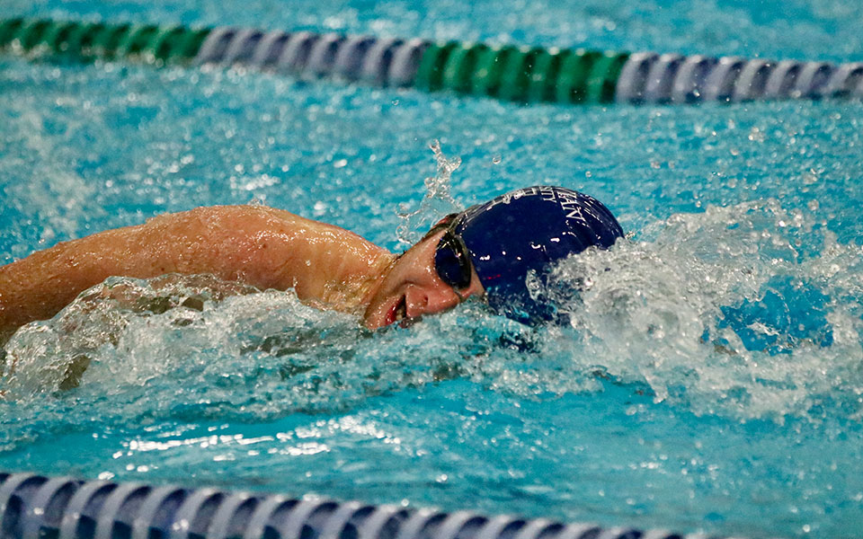 Greyhound swimmer competes at Drew University.