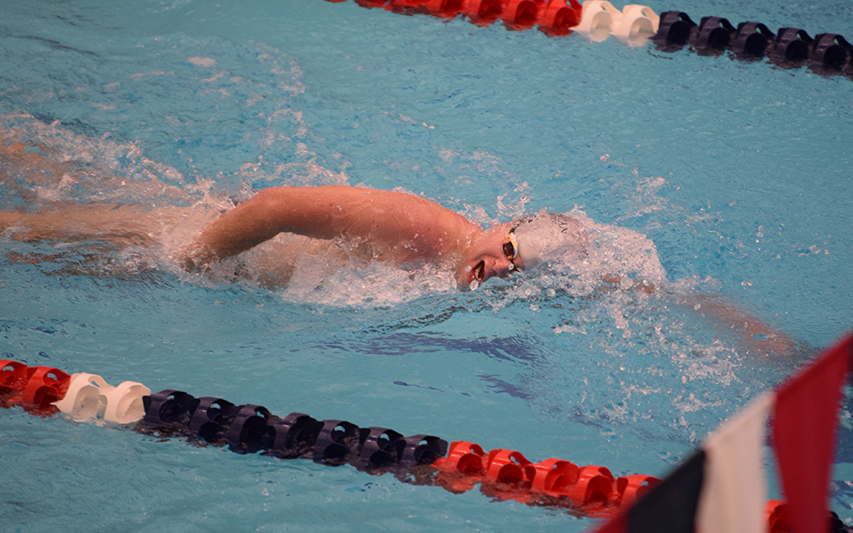 Sophomore Harrison Ziegler swims in the 500-yard freestyle in a double dual with Goucher College and Susquehanna University at Liberty High School.
