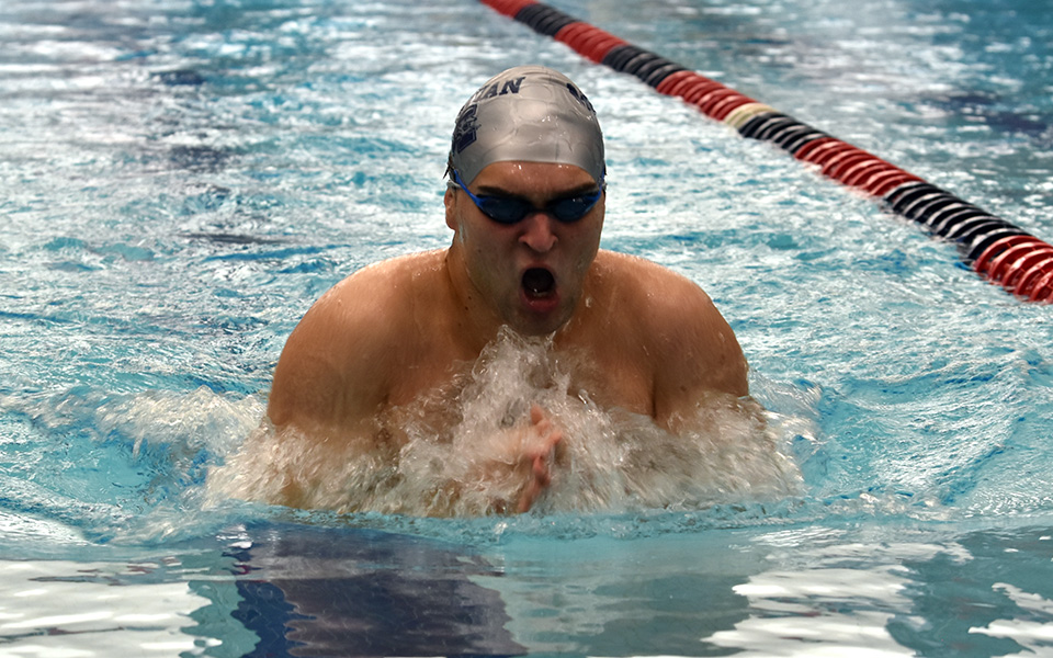 Freshman Alden Zimmerman competes in the 200-yard individual medley versus Juniata College at Liberty High School's Memorial Pool. Photo by Grace Nelson '26