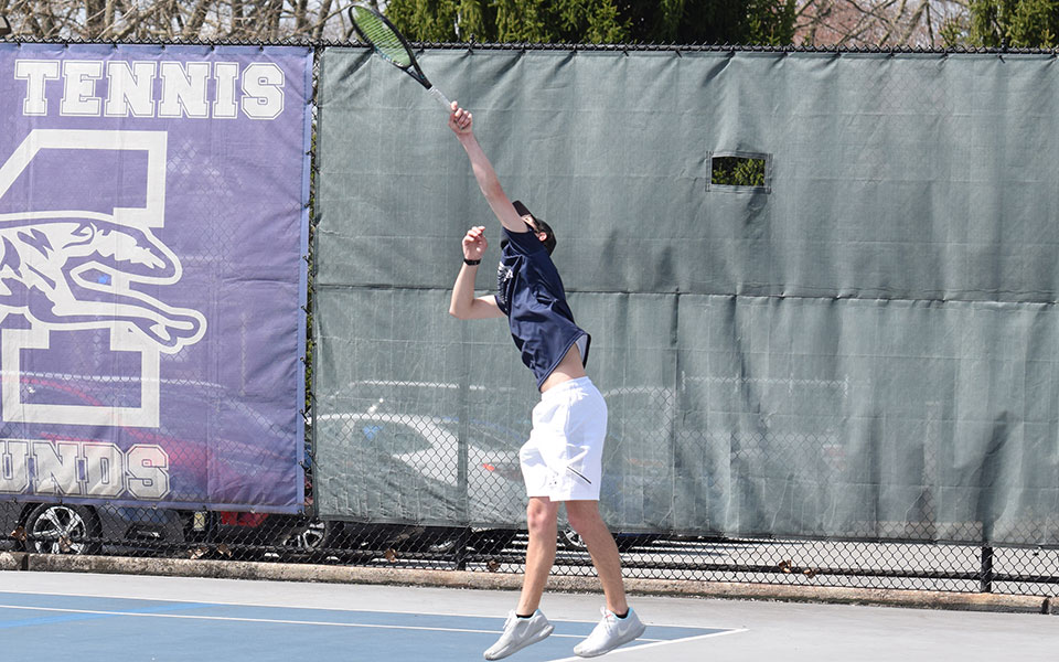 Aidan Evans-Gartley serves during singles in a match versus Drew University at Hoffman Courts on March 27, 2021.