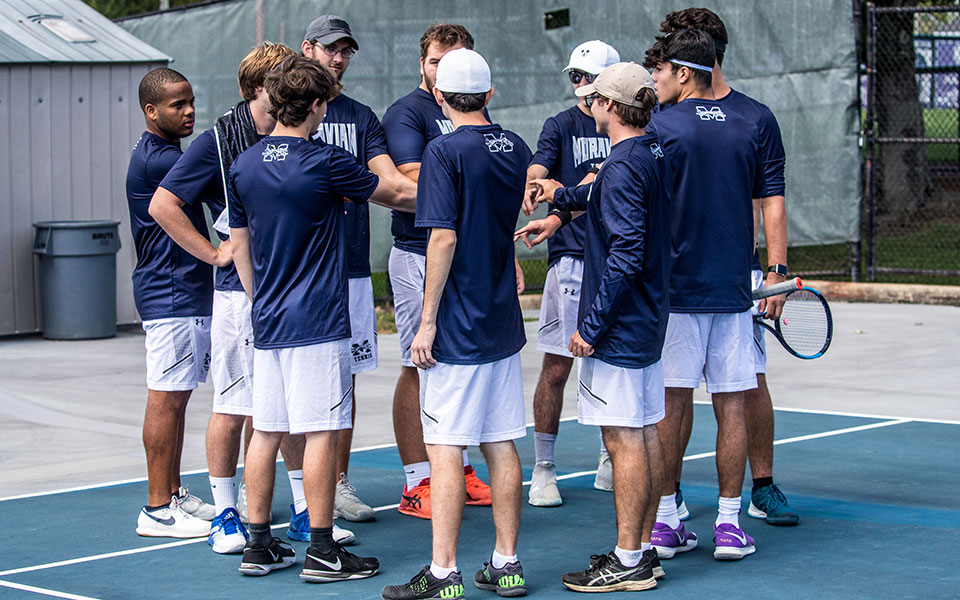 The Greyhounds get set for a match with Arcadia University in September 2021 on Hoffman Courts. Photo by Cosmic Fox Media / Matthew Levine '11