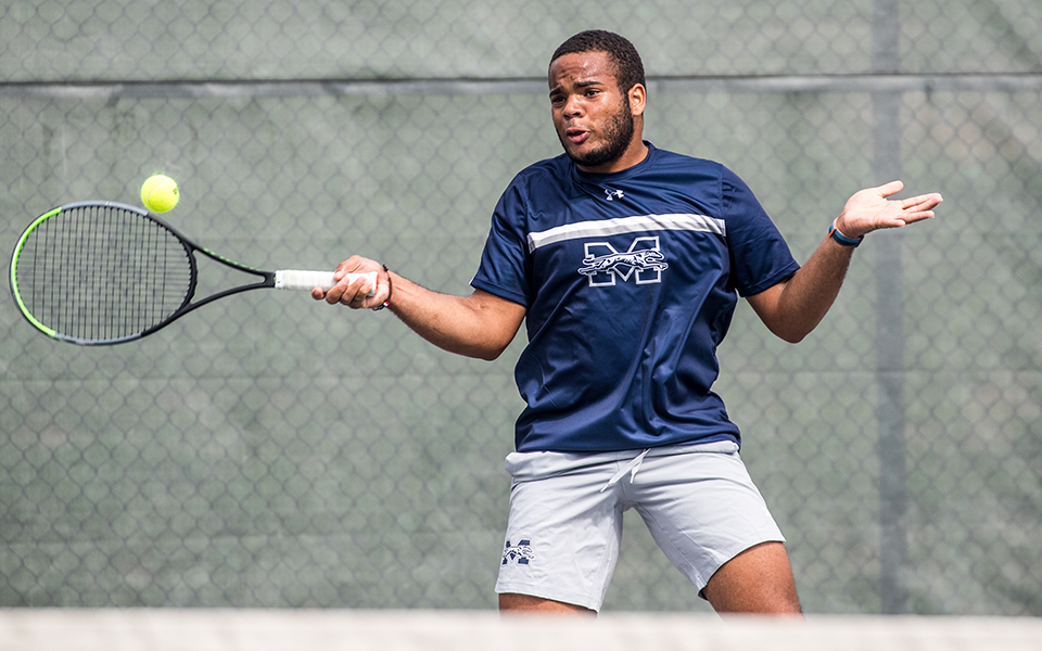 Sophomore Ronny Pimentel Ferrer returns a shot in a match versus DeSales University at Hoffman Courts earlier this season. Photo by Cosmic Fox Media / Matthew Levine '11