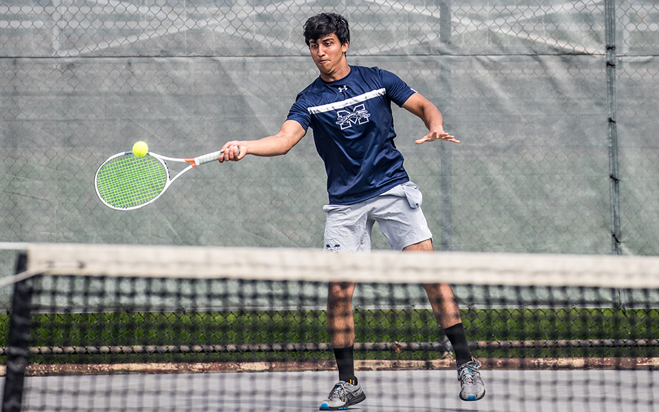 Freshman Shayaan Farhad hits a forehand in a match versus DeSales University at Hoffman Courts during the 2022 fall season. Photo by Cosmic Fox Media / Matthew Levine '11