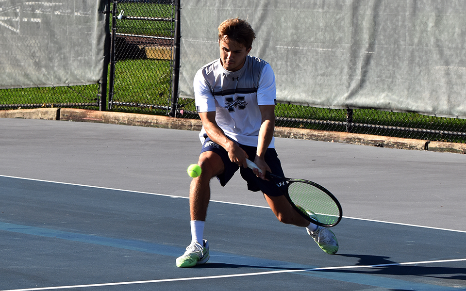 Sophomore Wyatt Marshall returns a shot in doubles action versus FDU-Florham at Hoffman Courts during the fall portion of the 2022-23 season.
