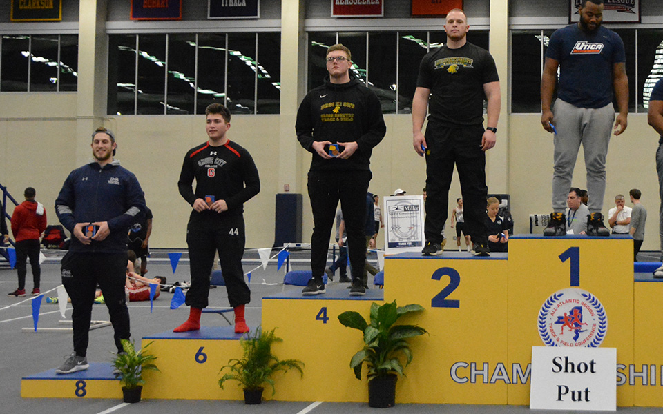 Sophomore Shane Mastro on the podium at the 2019 All-Atlantic Region Indoor Track & Field Championships after placing eighth in the shot put.