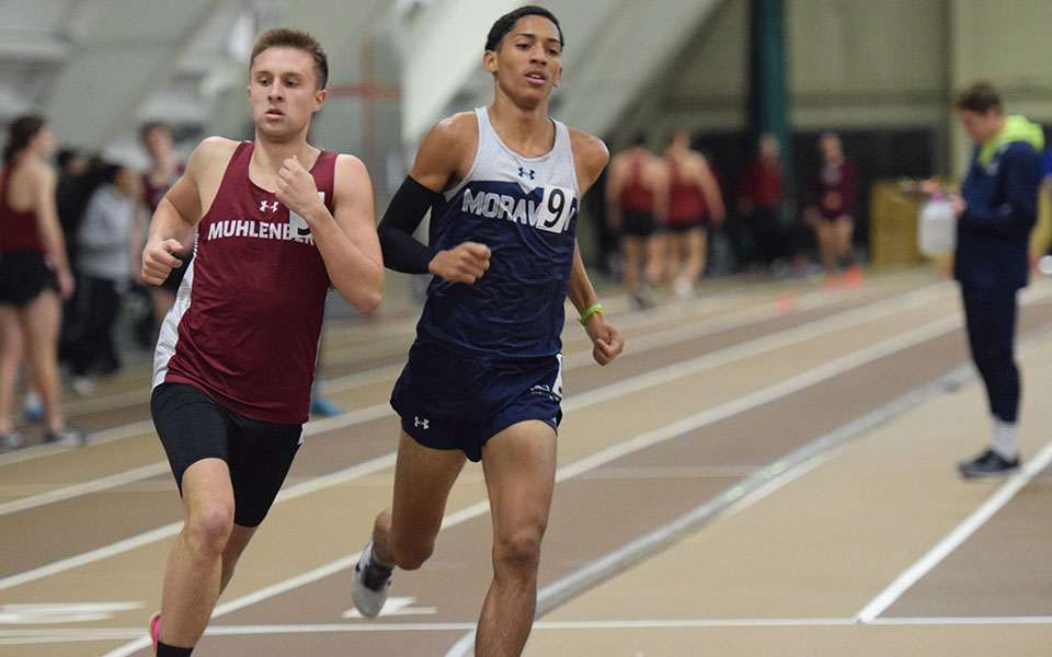 Freshman Darlyn Fermin starts around a turn during a race at the Moravian Indoor Meet held at Lehigh University's Rauch Field House.