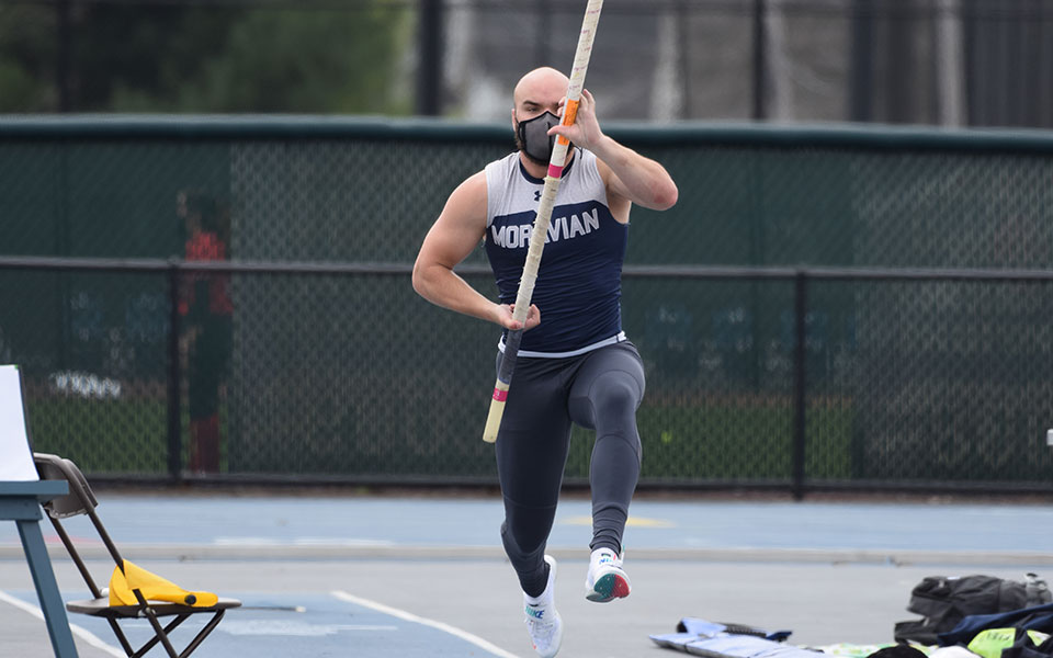 Graduate student Scott Goodwin '19 heads down the pole vault runway during the 2021 Greyhound Invitational.
