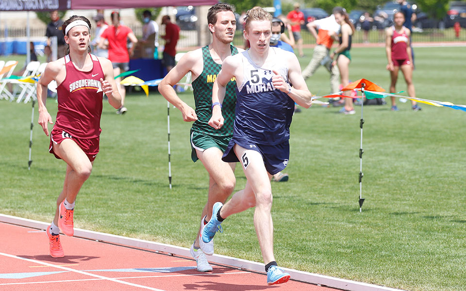 Graduate student Greg Jaindl '20 leads the pack in the 1,500-meter run during the All-Atlantic Region Outdoor Championships at St. John Fisher (N.Y.) College. Photo courtesy of Wyatt Eaton, Elizabethtown College Athletic Communications.