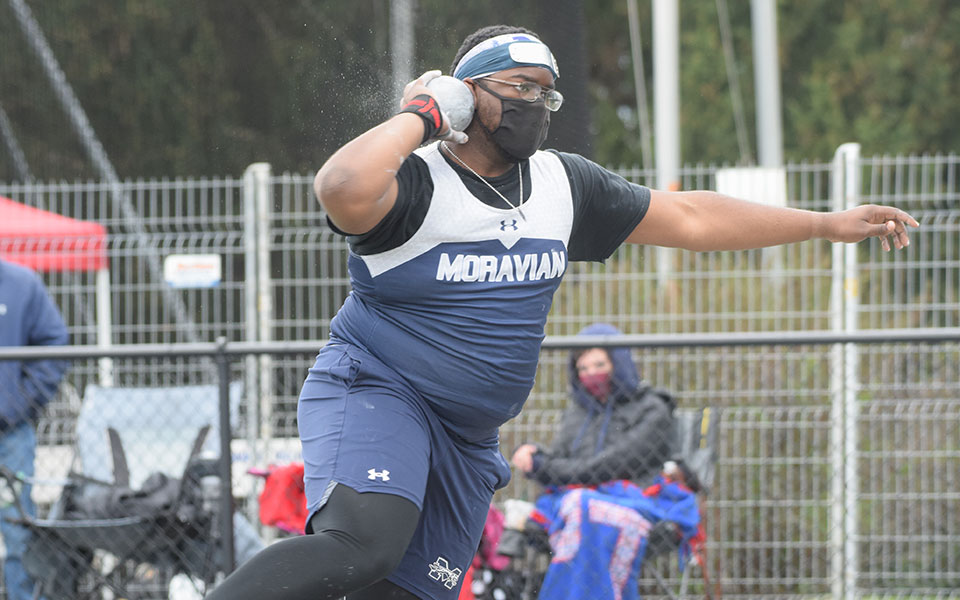 Tim King '21 competes in the shot put during the Coach P Invitational at Timothy Breidegam Track.