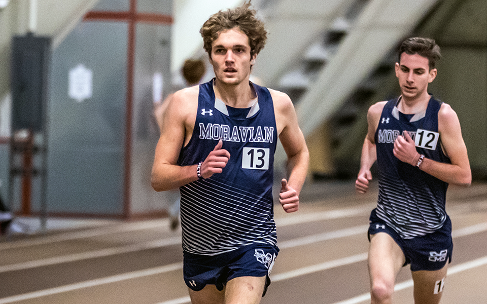 Sophomore Casey Frank runs during the Moravian Indoor Invitational at Lehigh University's Rauch Fieldhouse in January 2022. Photo by Cosmic Fox Media / Matthew Levine '11