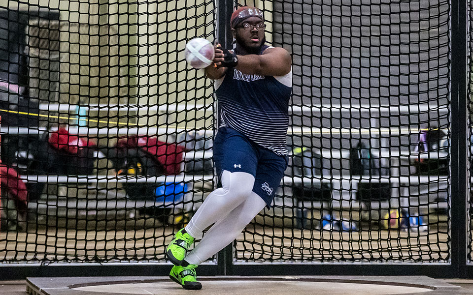 Senior Tim King competes in the weight throw at the Moravian Indoor Meet hosted at Lehigh University's Rauch Fieldhouse in January 2022. Photo by Cosmic Fox Media / Matthew Levine '11