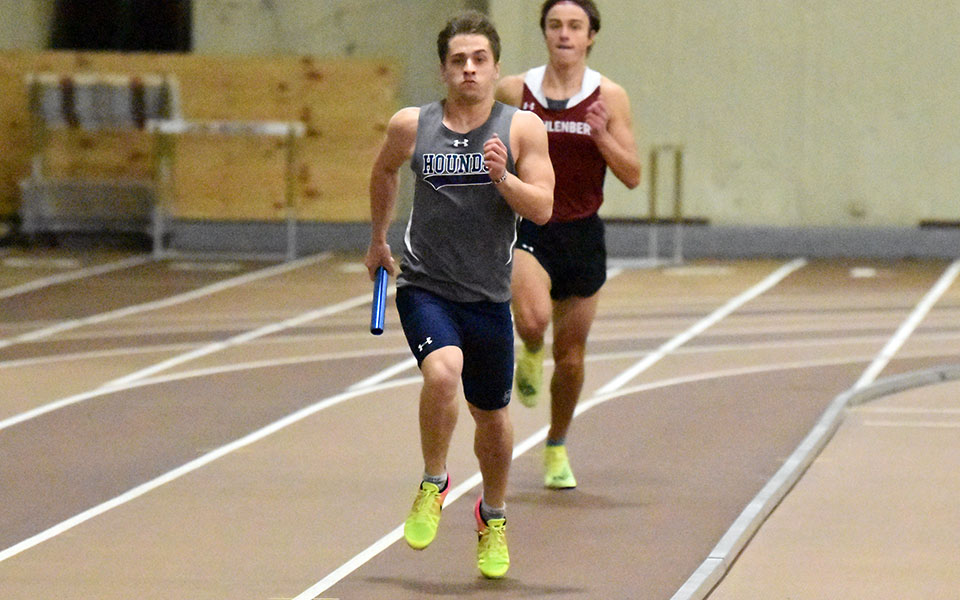 Senior Brad Clemson runs in a relay race at the Lehigh University Fast Times Before Finals in December 2021.
