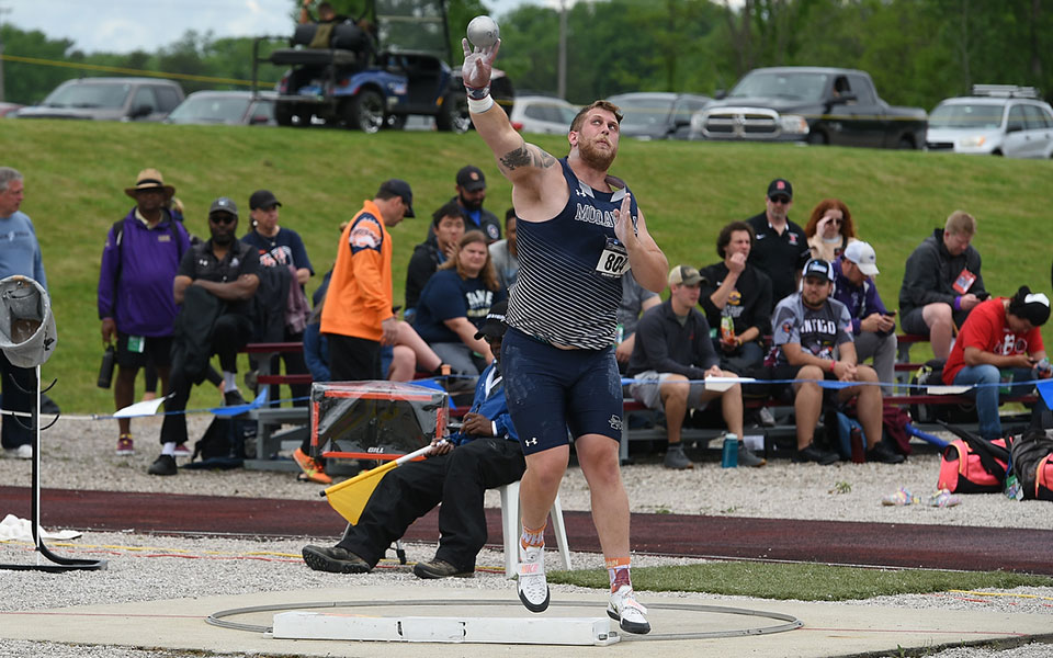 Graduate student Shane Mastro '21 unleashes his third attempt in the shot put at the 2022 NCAA Division III Outdoor Track & Field National Championships at the SPIRE Institute in Geneva, Ohio. Photo by D3photography.com/Shane