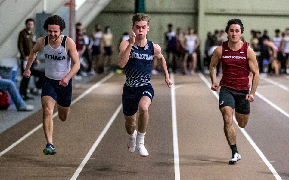 Sophomore Trevor Gray comes towards the finish line in the 60-meter dash during the 2022 Moravian Indoor Meet at Lehigh University's Rauch Fieldhouse. Photo by Cosmic Fox Media / Matthew Levine '11
