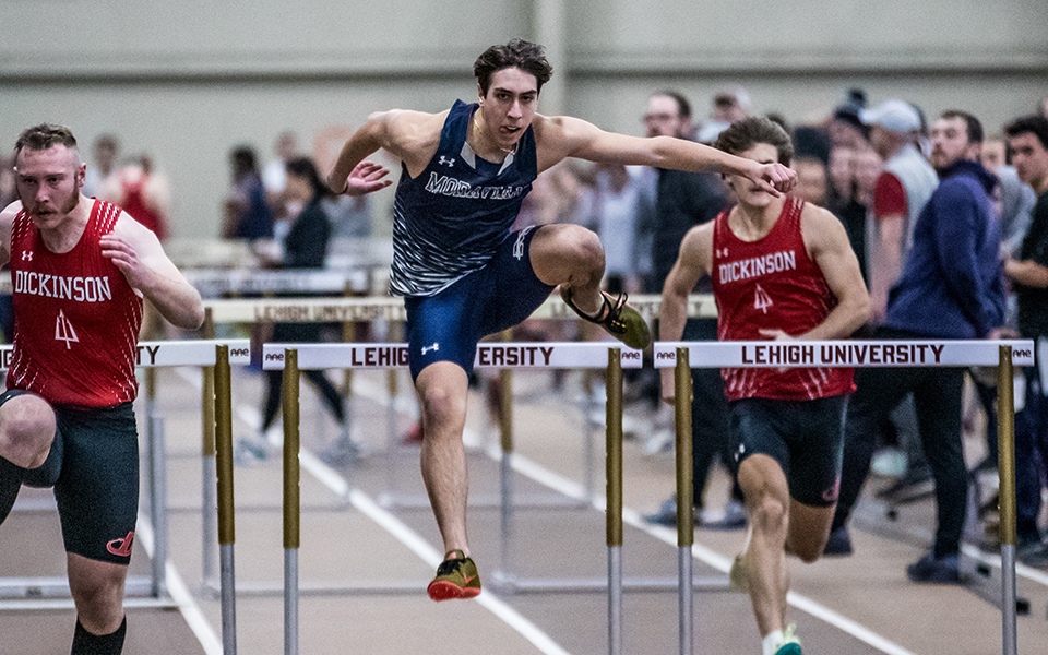 Freshman Josh Swain competes in the 60-meter hurdles during the Moravian Indoor Meet at Lehigh University's Rauch Fieldhouse earlier this season. Photo by Cosmic Fox Media / Matthew Levine '11
