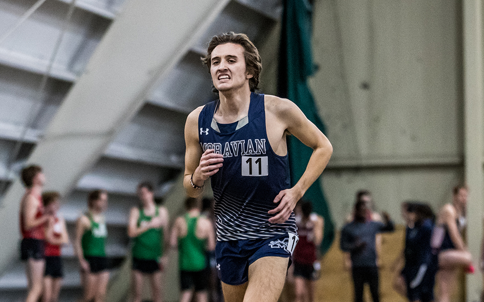 Senior Shane Houghton races in the 3,000-meter run during the Moravian Indoor Meet at Lehigh University earlier this season. Photo by Cosmic Fox Media/Matthew Levine '11